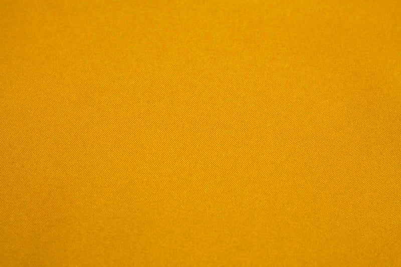 Tissu Burlington Toile résistante Unie Jaune Safran