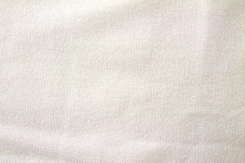 Tissu Maille Pull Confort Uni Blanc cassé