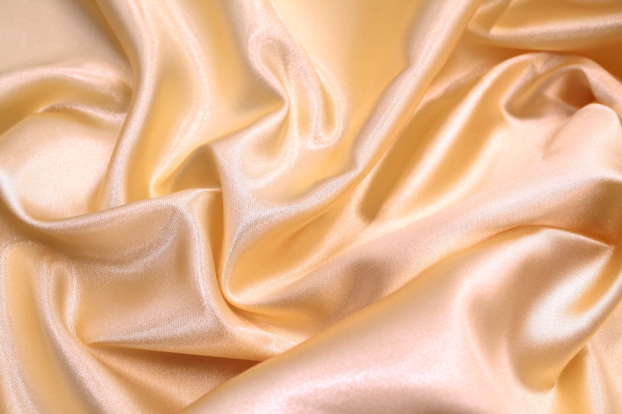 Tissu Satin Polyester Uni Or clair