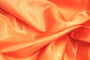 Tissu Satin Polyester Uni Orange