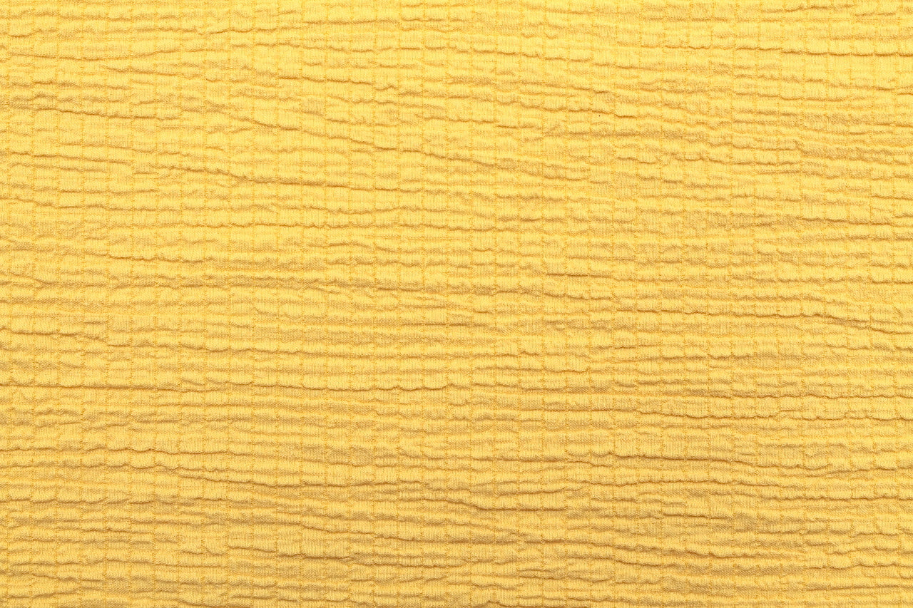 Tissu Viscose Gaufrée Unie Jaune Safran